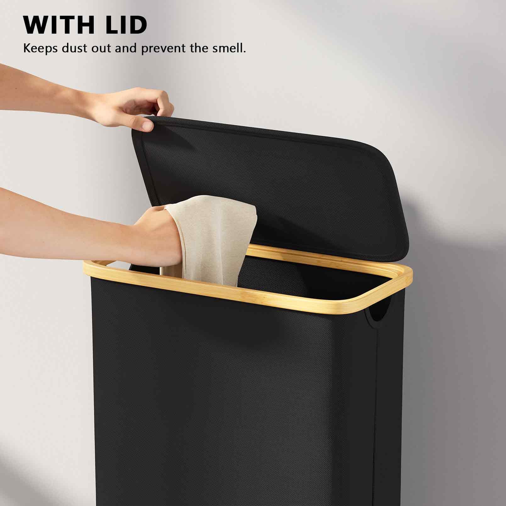 SpaceAid Slim Laundry Hamper with bamboo frame stands upright for easy carrying.