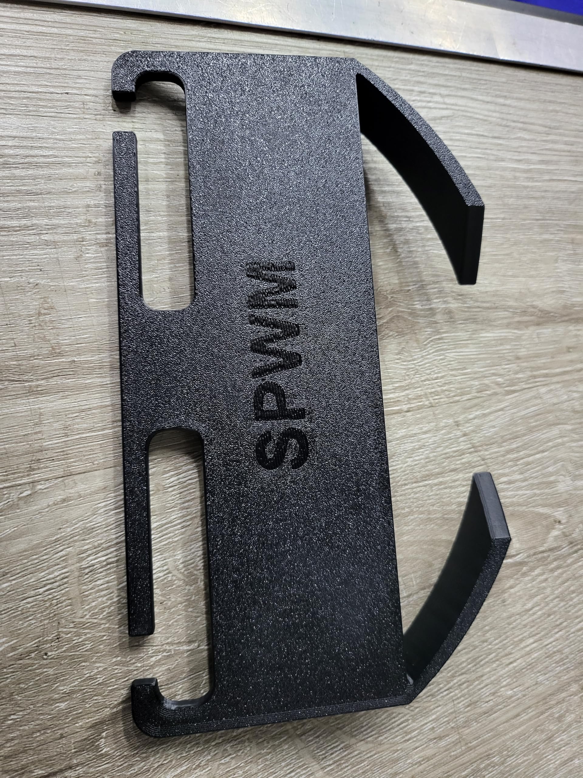 SPWM CabCap patent-pending headrest hat holder