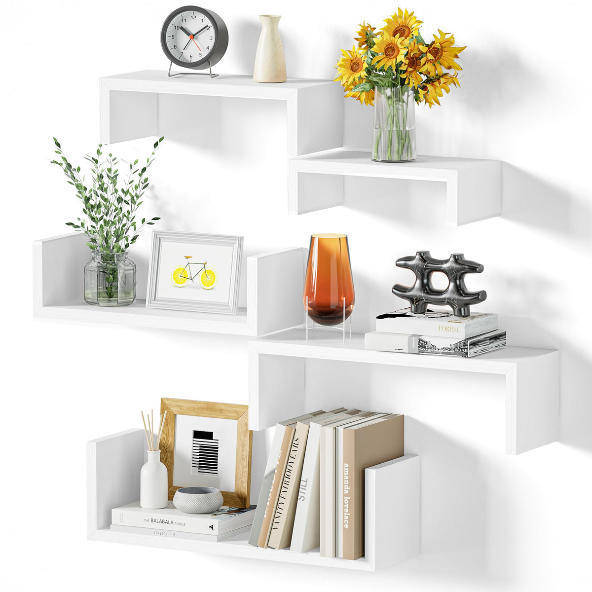 SRIWATANA floating shelves on white wall showing organized photo and plant display.