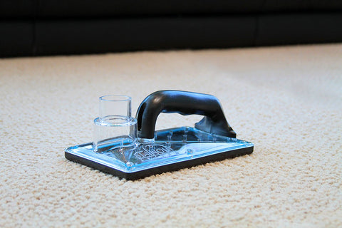 StainOut System 71-001 in action beneath carpet targeting odor sources.