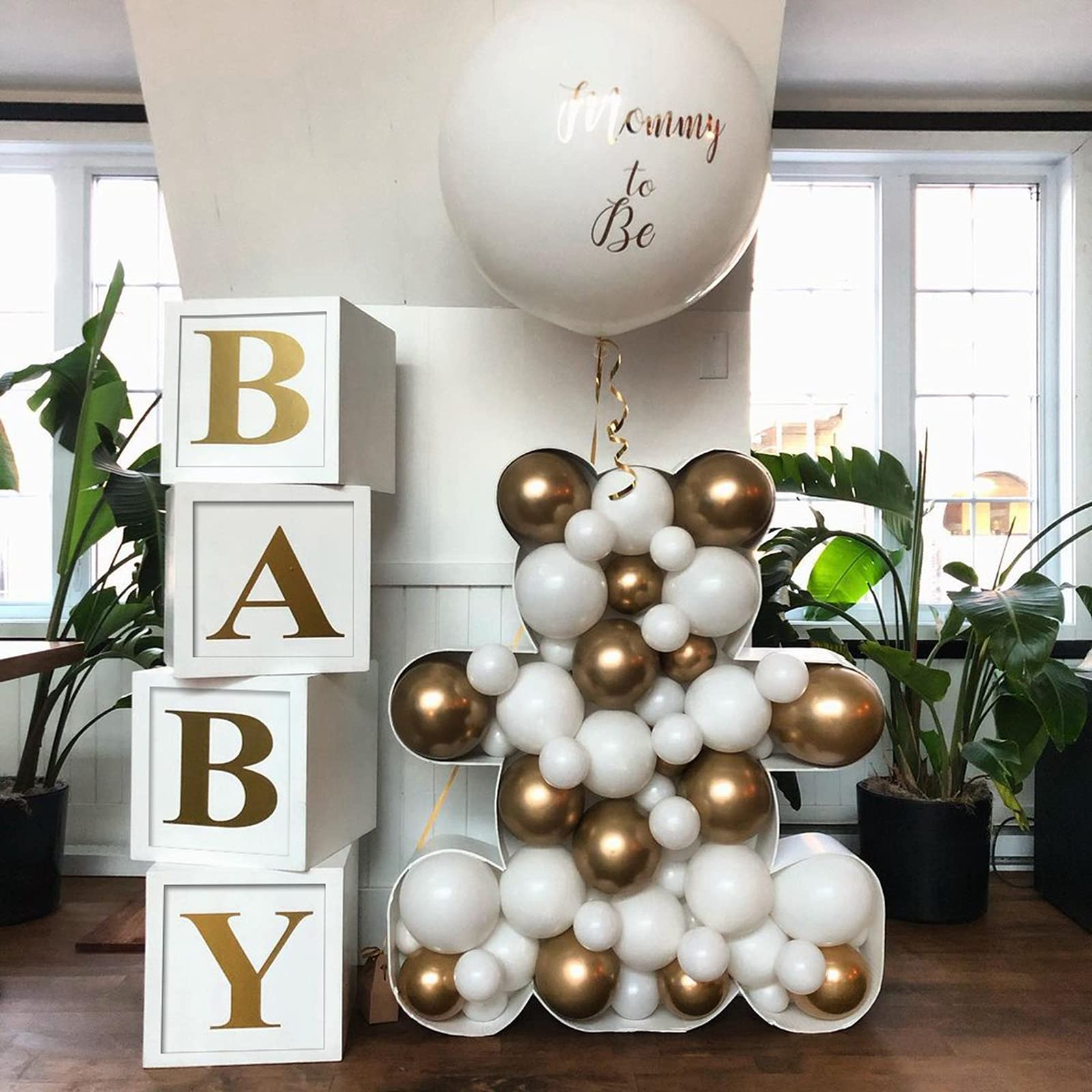 Staraise baby shower boxes displayed as a chic backdrop setup for events