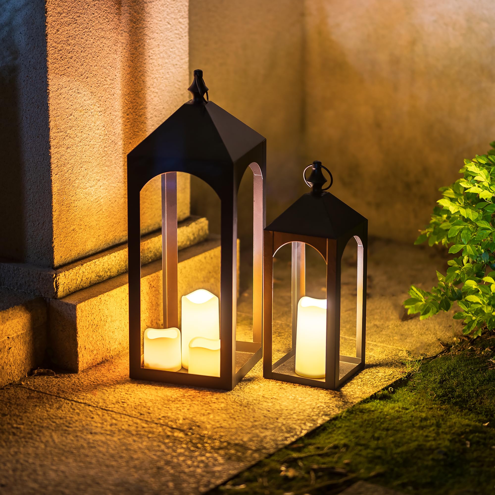 Staymoment black metal lantern with gazebo arch for modern exterior decor.