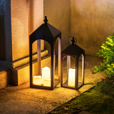 Staymoment black metal lantern with gazebo arch for modern exterior decor.
