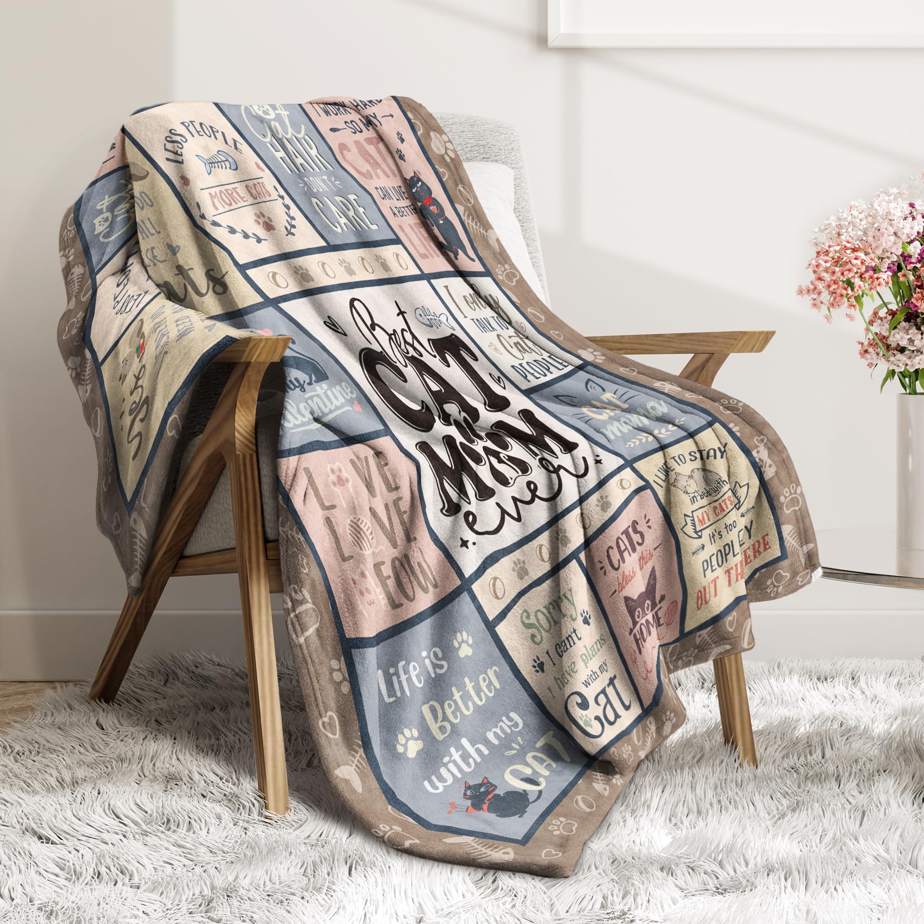 SteadStyle cat mom blanket while lounging with a cat on sofa