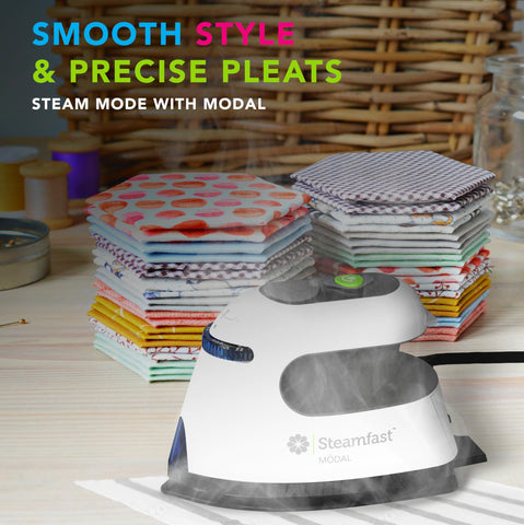 Steamfast Modal Dual-Voltage Iron with cord wrap for tidy storage and travel readiness.