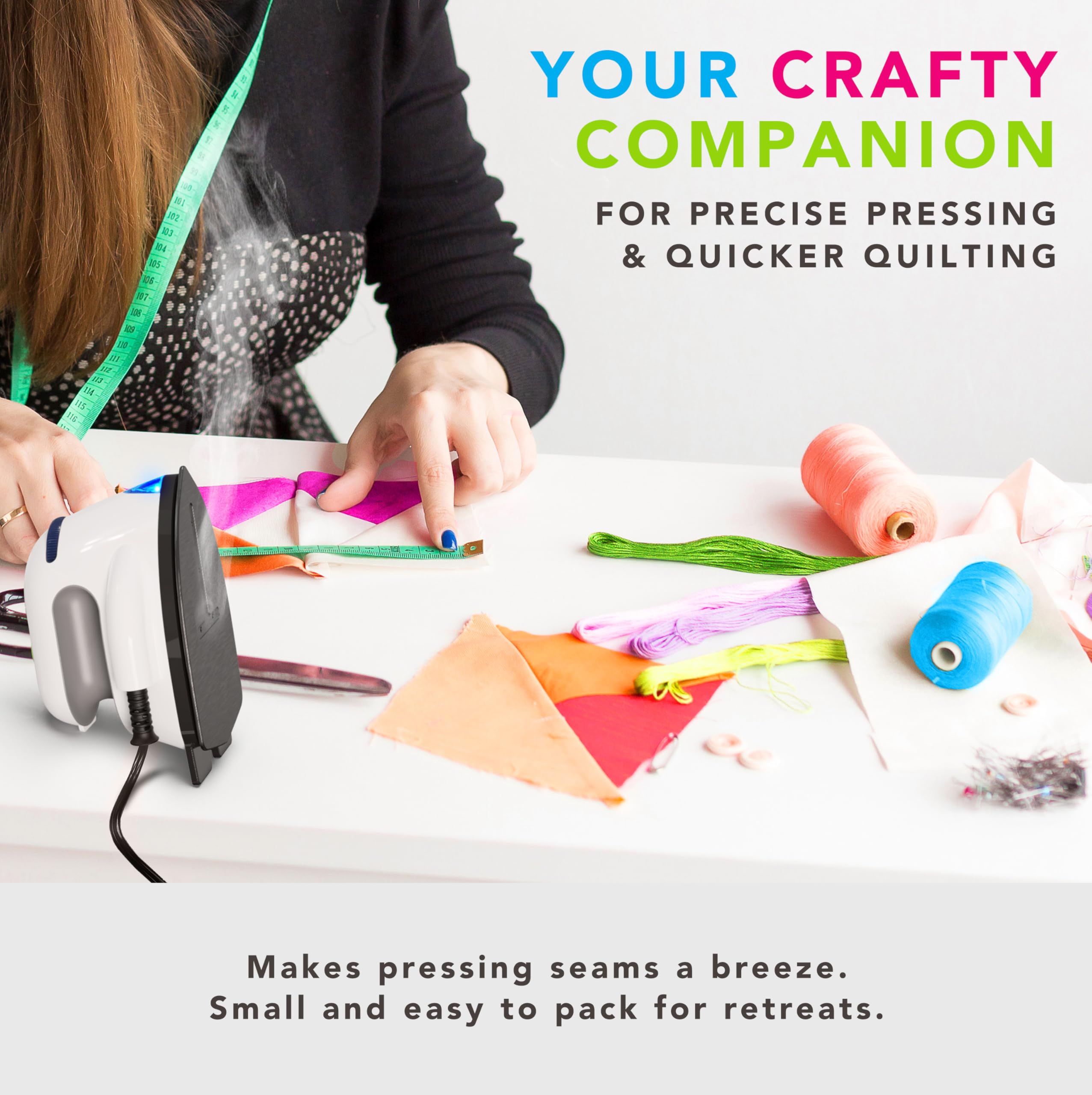 Steamfast Modal Dual-Voltage Iron in a travel bag highlighting portable design.