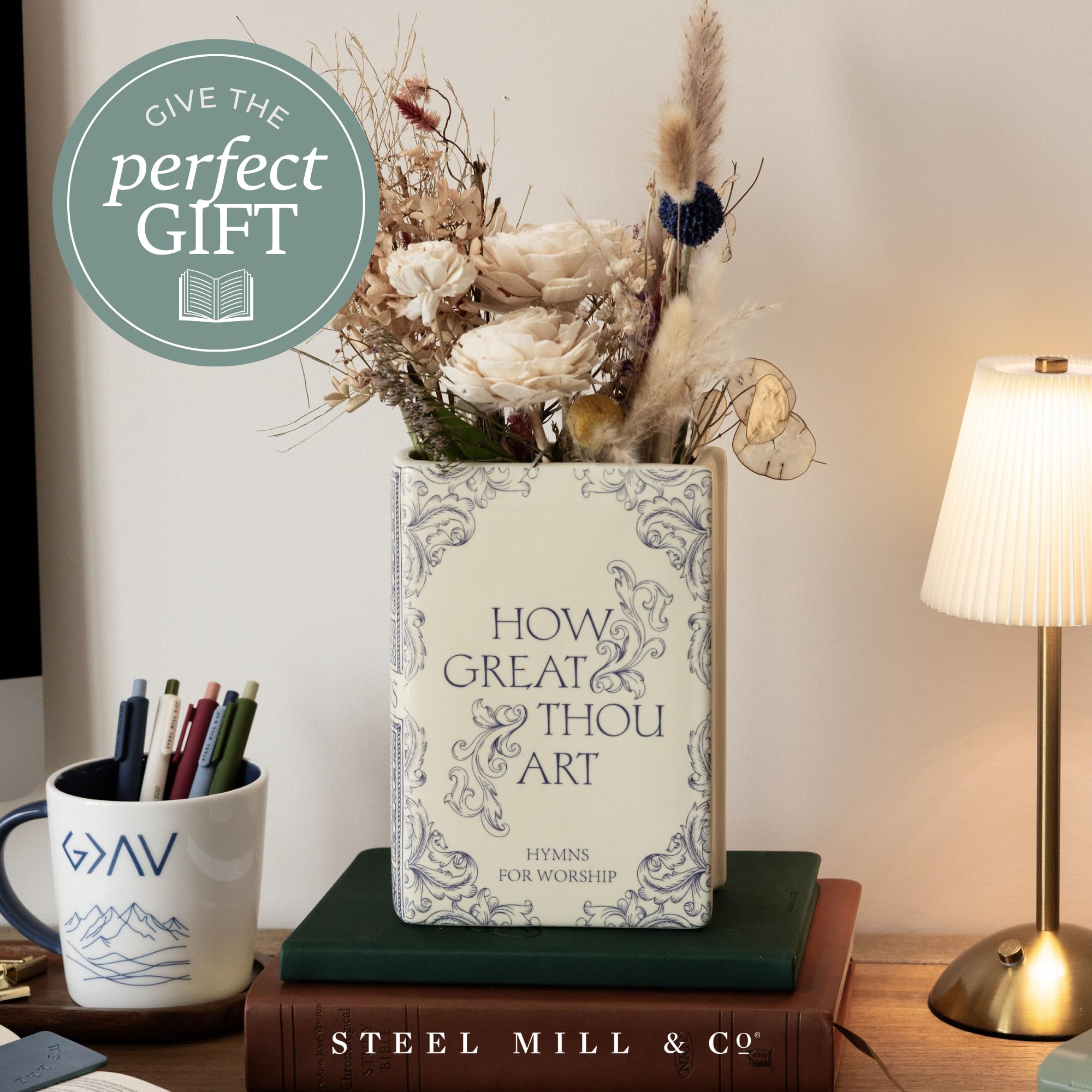 Steel Mill & Co book vase with flowers setup on a table
