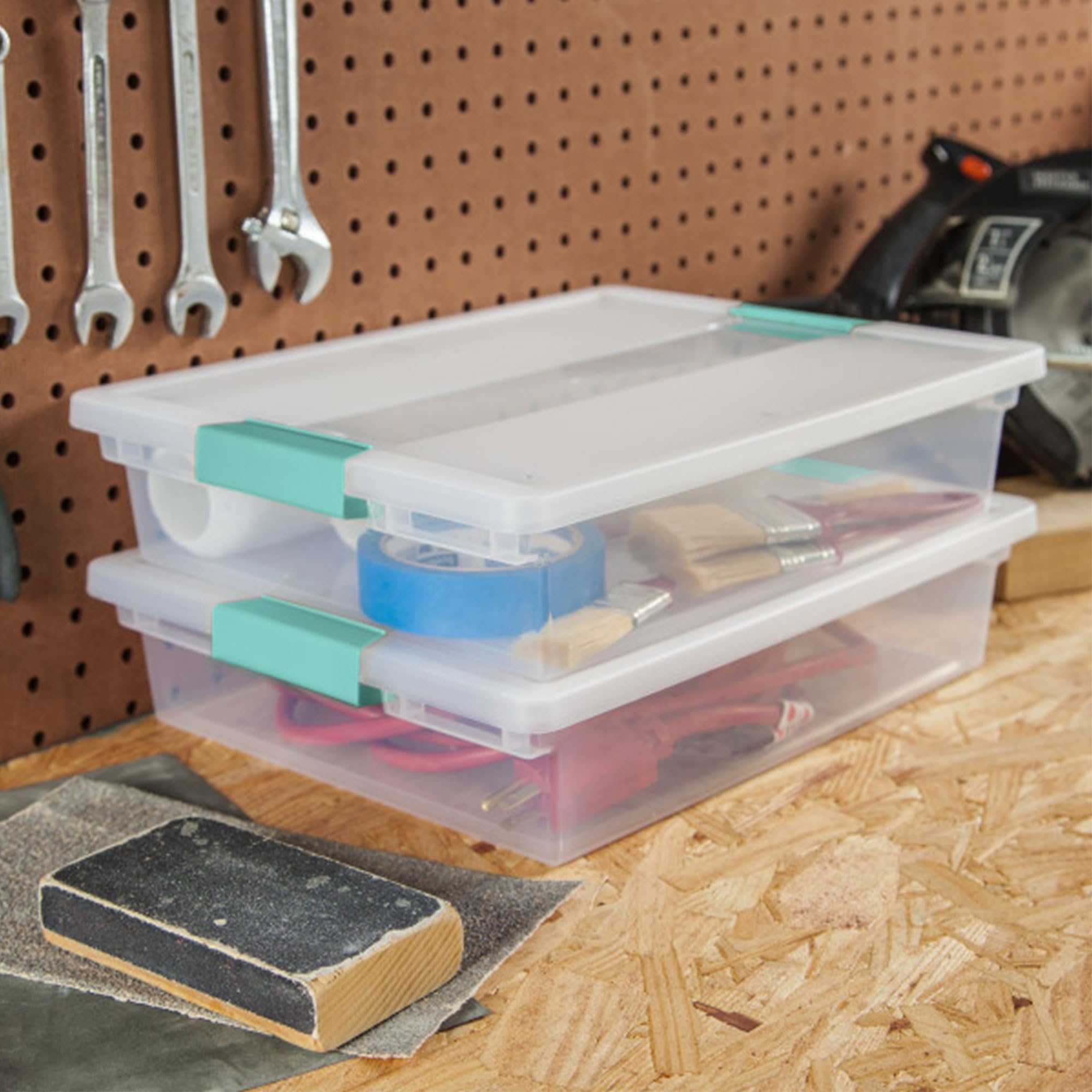 Sterilite clip box fits standard 8.5x11 papers and notebooks.