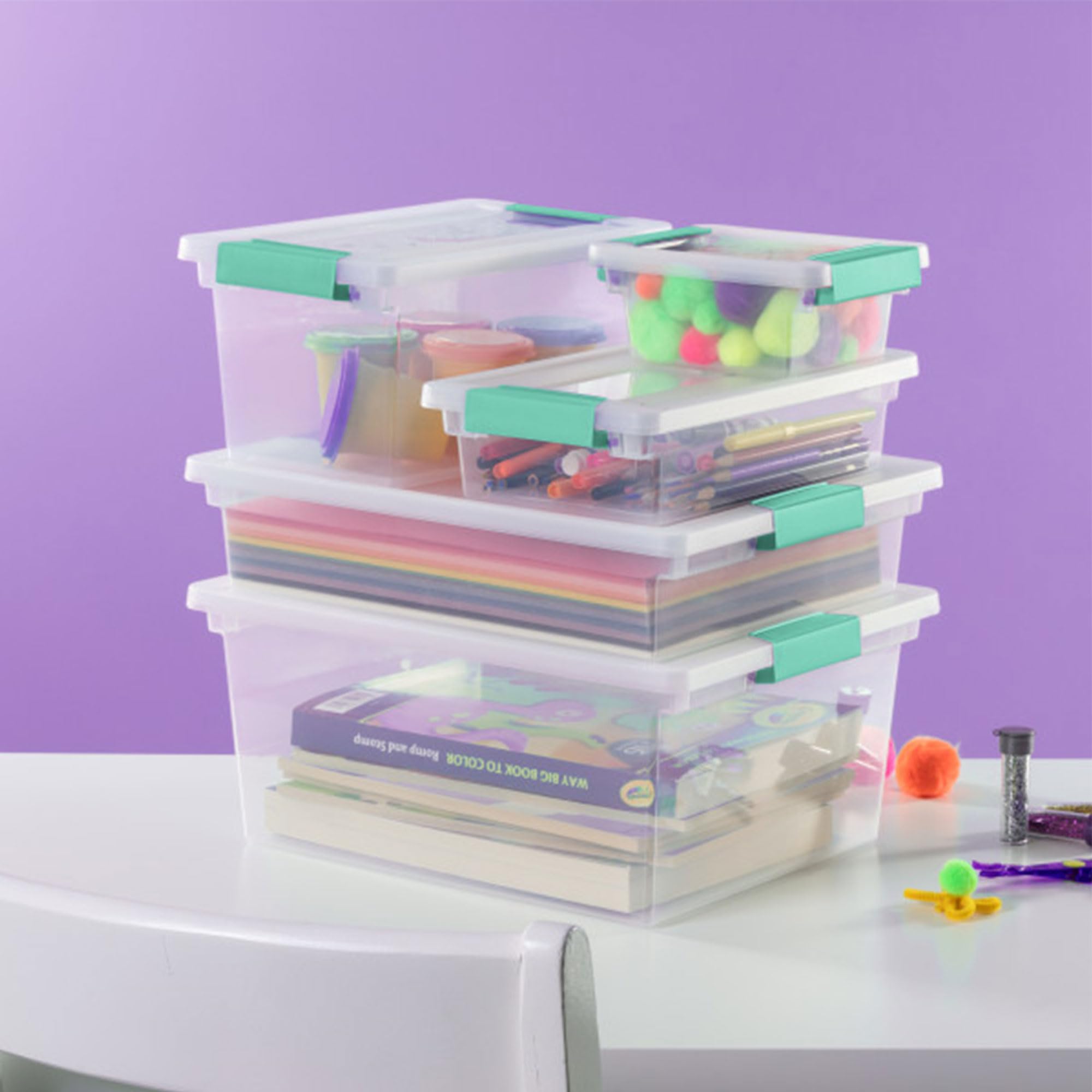 Sterilite office supplies organization bin keeps desk items neatly stored.