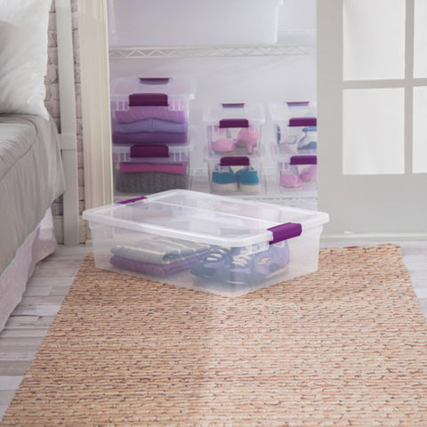 Sterilite stackable bin on shelf enables compact storage.