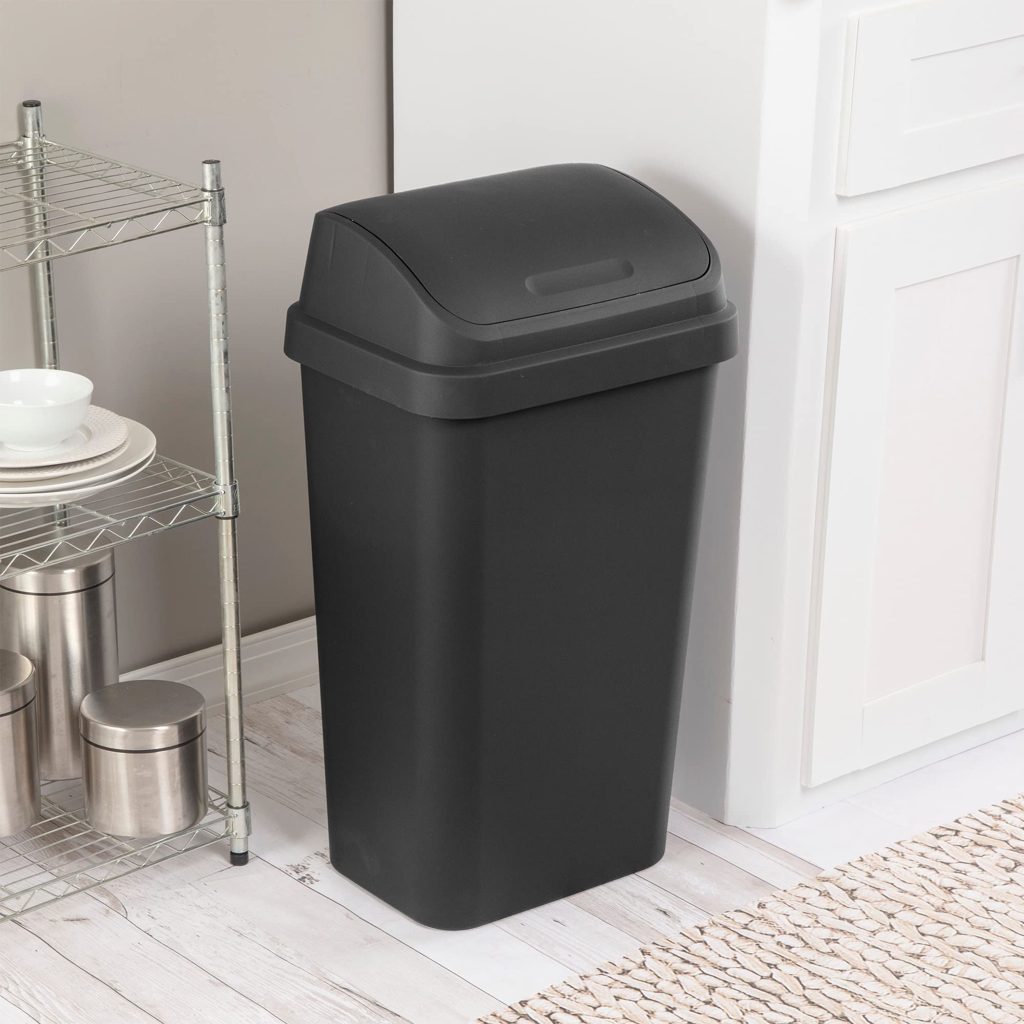 Sterilite SwingTop 13-gallon wastebasket for kitchen or garage, versatile use.