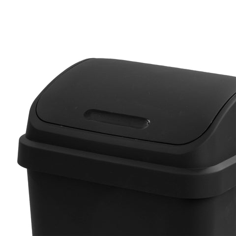 Sterilite SwingTop wastebasket with lid, side angle for quick disposal.