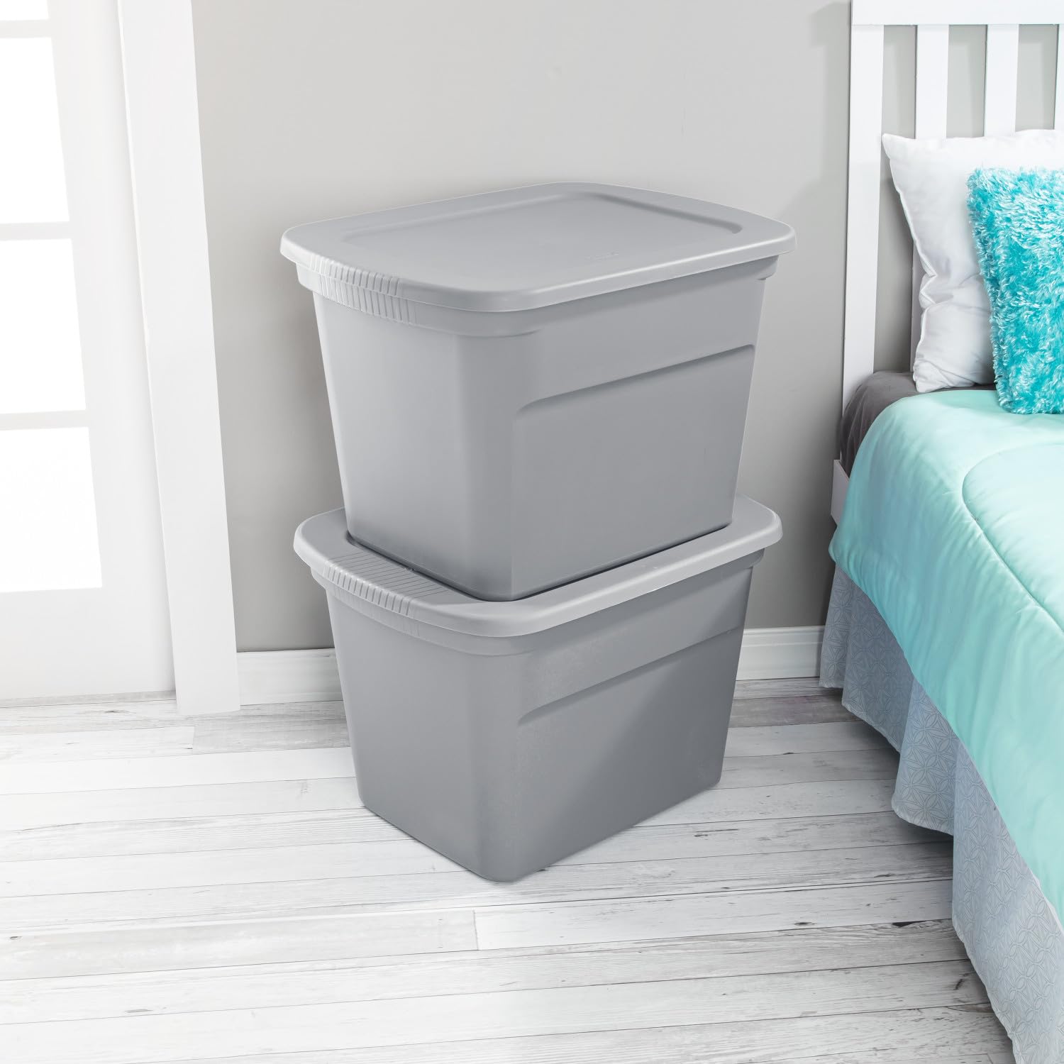 Sterilite tote in closet setup keeps seasonal décor neatly organized.