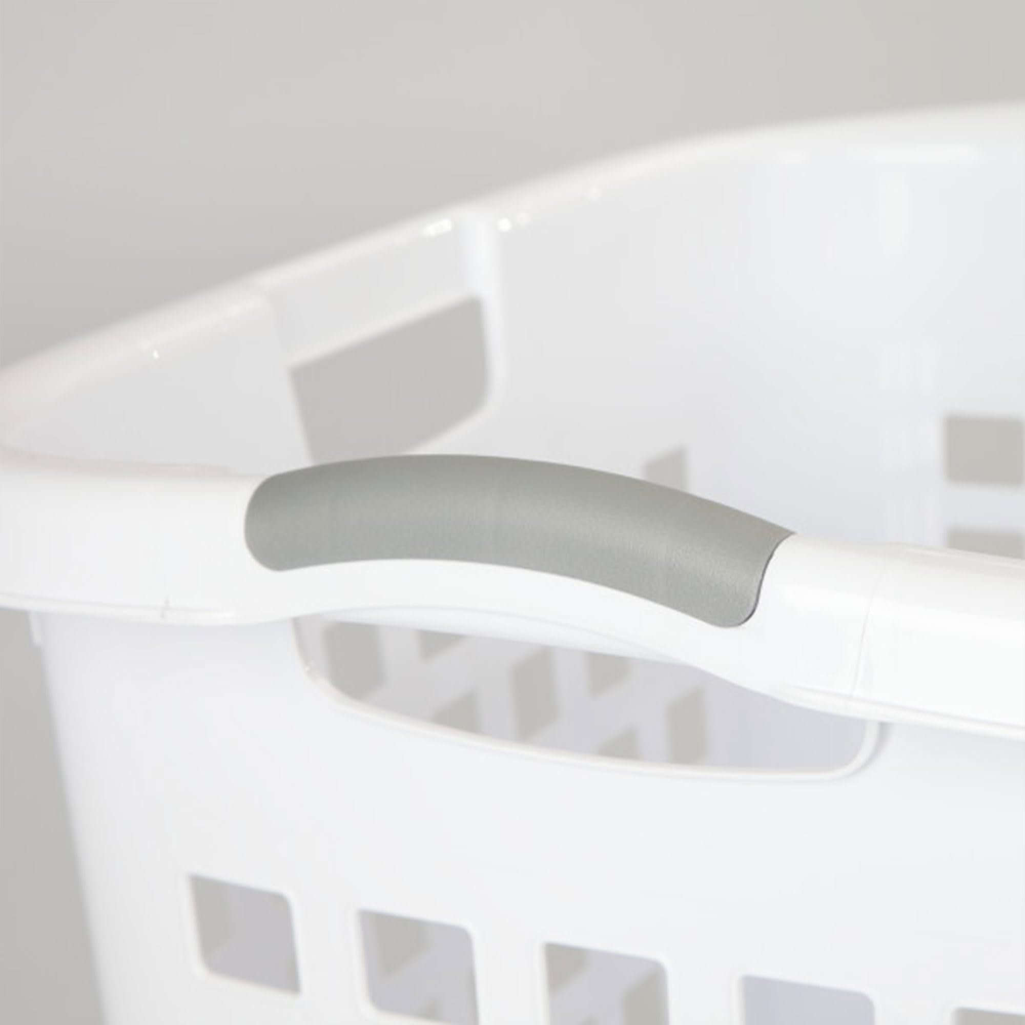 Sterilite Ultra Easy Carry Hamper stacked with other baskets for tidy closet organization.