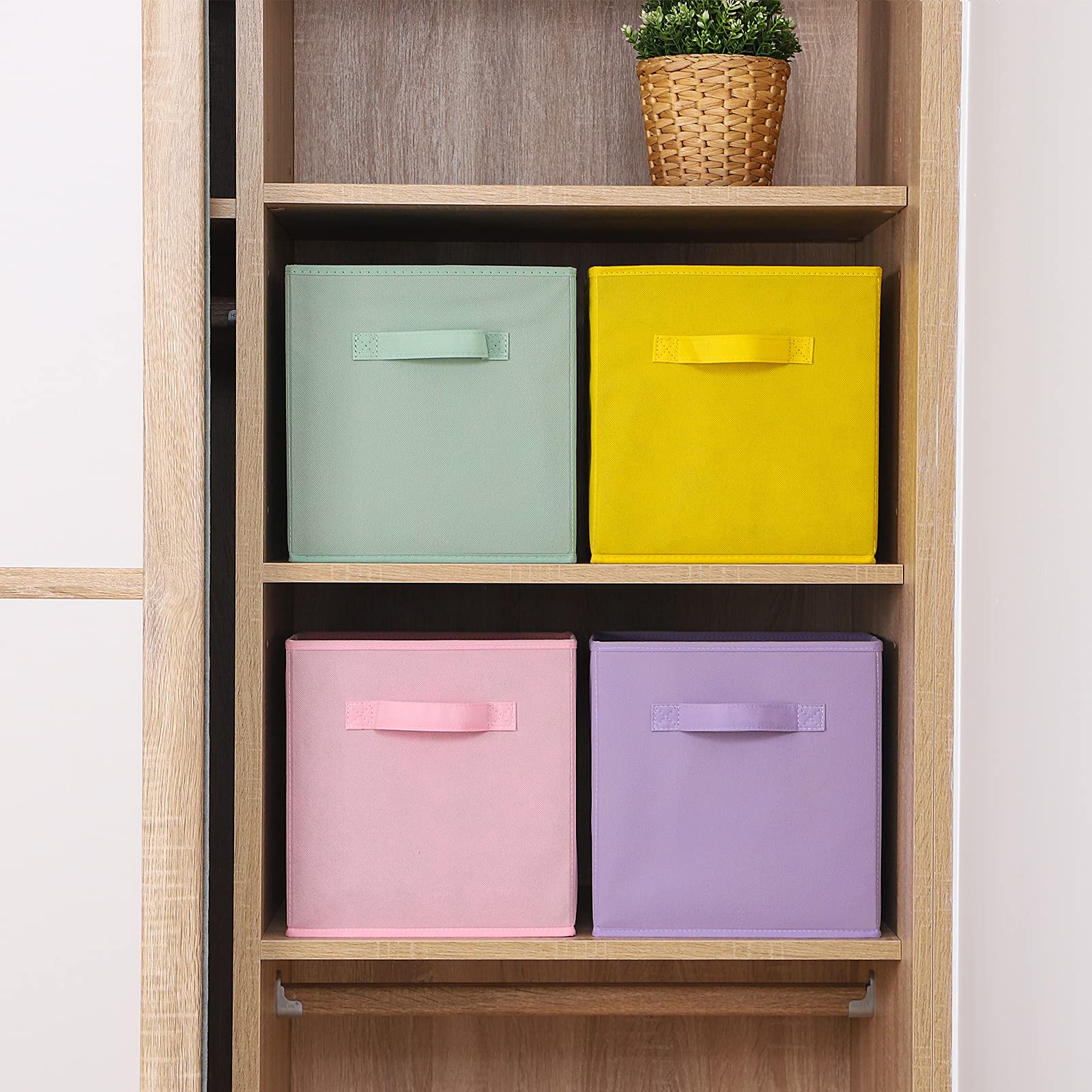 Stero Fabric Storage Bins support toy and book organization in playrooms.