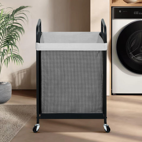 STO STO removable liner bag in a laundry cart for quick cleanup.