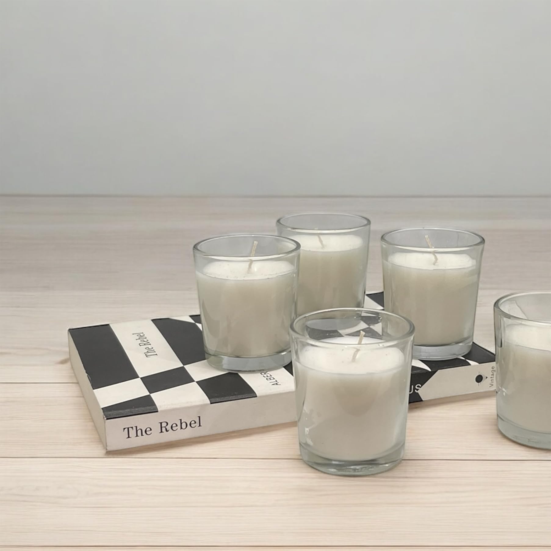 Stonebriar clear glass votive displaying a centerpiece setup