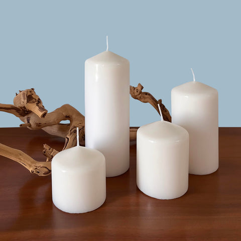Stonebriar 3x8 centerpiece candle in glass lantern setting.