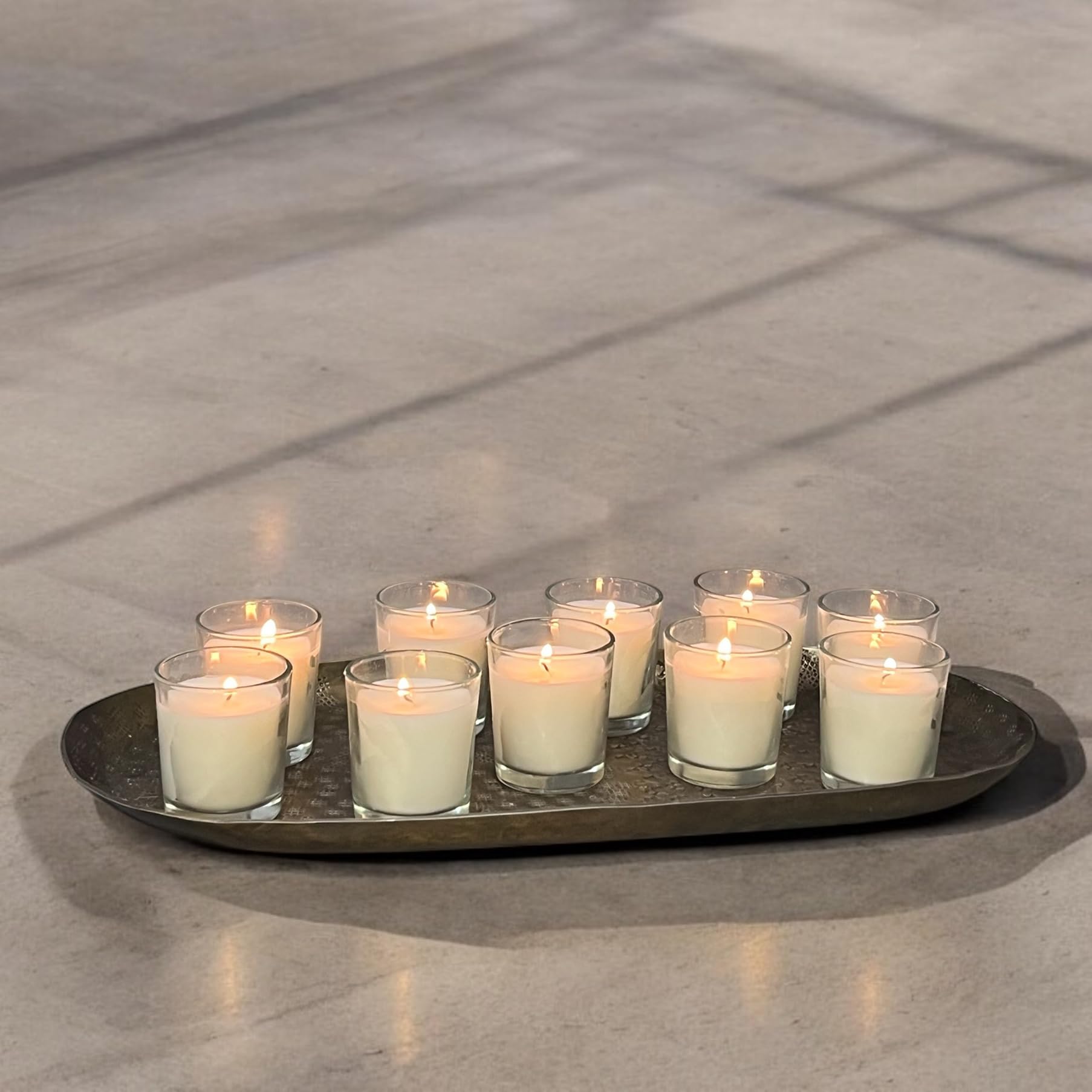 Stonebriar ivory wax votives offer steady burn for intimate dinners.