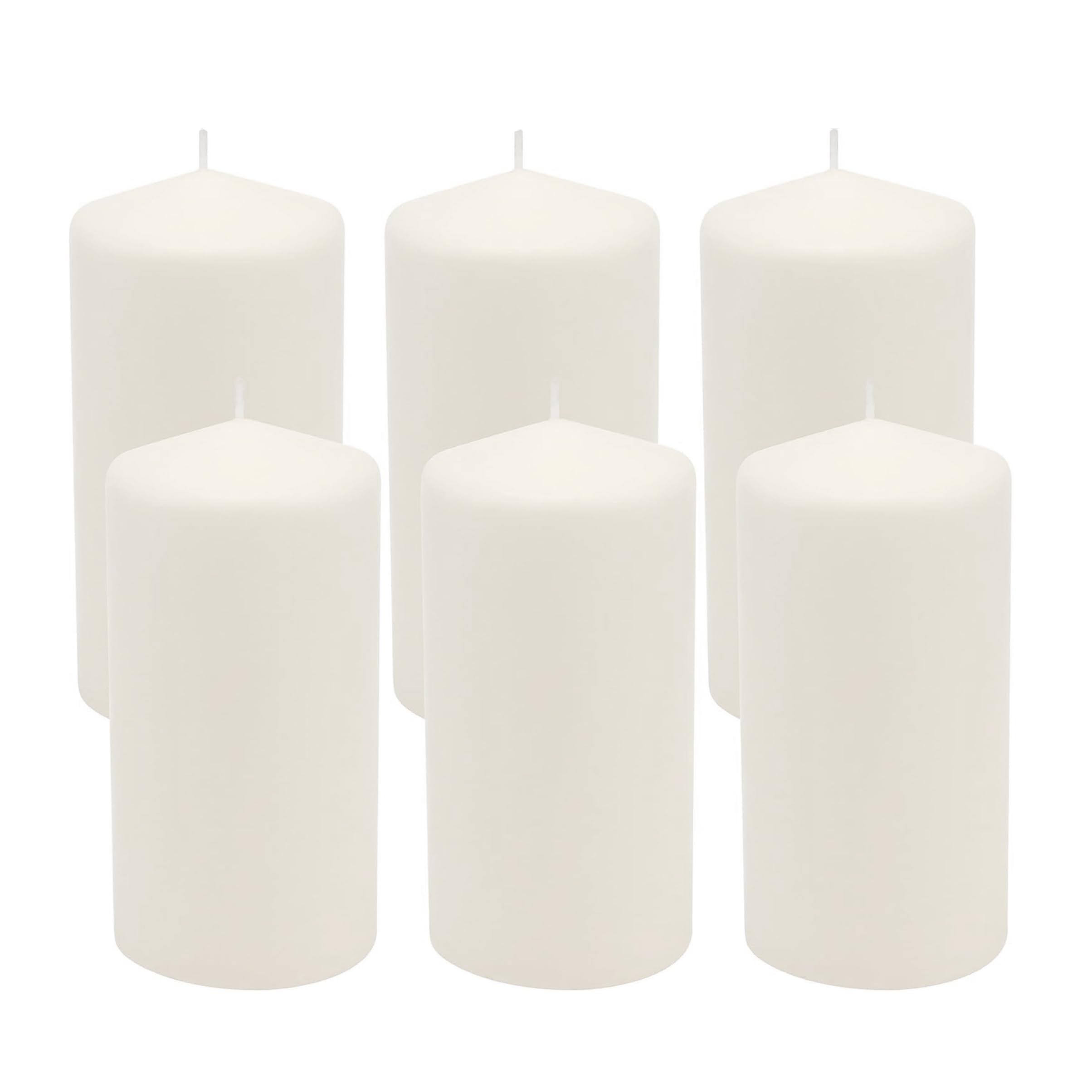 Stonebriar unscented white pillar candles glow softly for calm evenings.