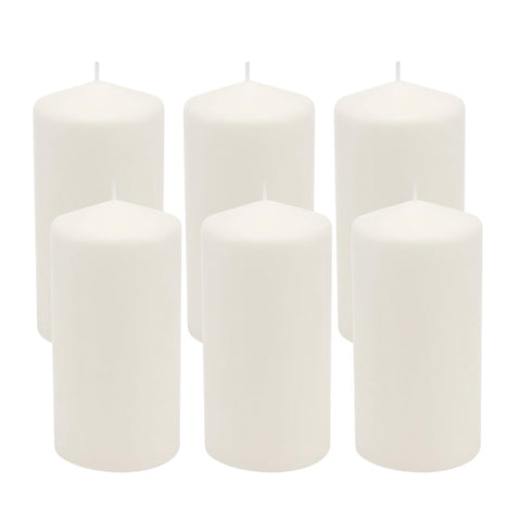 Stonebriar unscented white pillar candles glow softly for calm evenings.