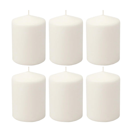 Stonebriar unscented white tall pillar candle in a lantern for warm ambience.