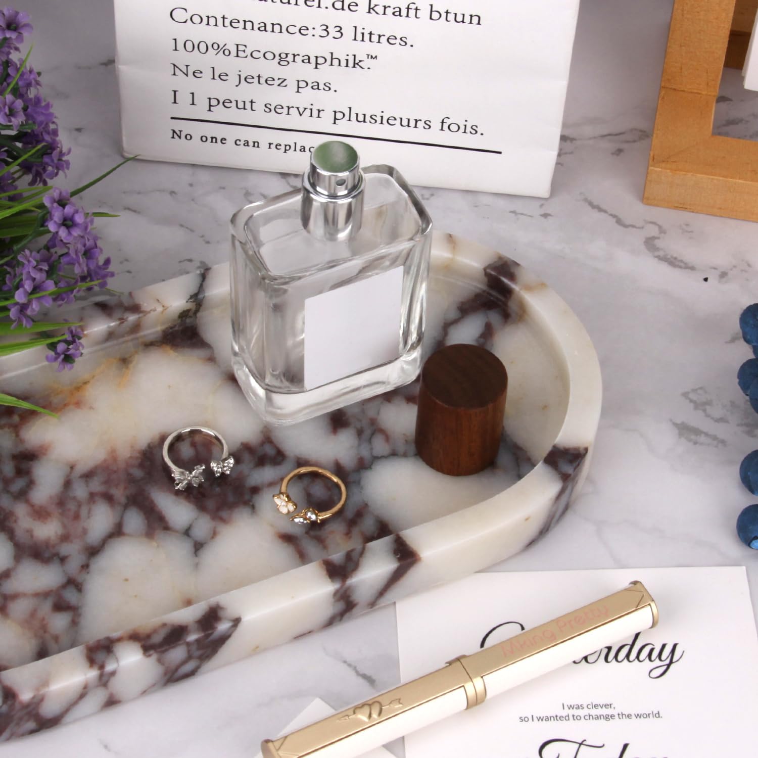 Stonemanus oval marble tray as a key catch for entryways