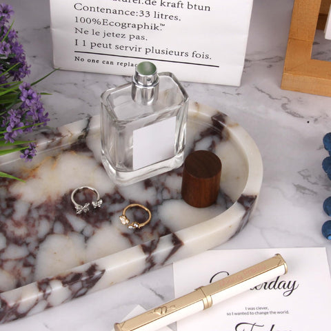 Stonemanus oval marble tray as a key catch for entryways