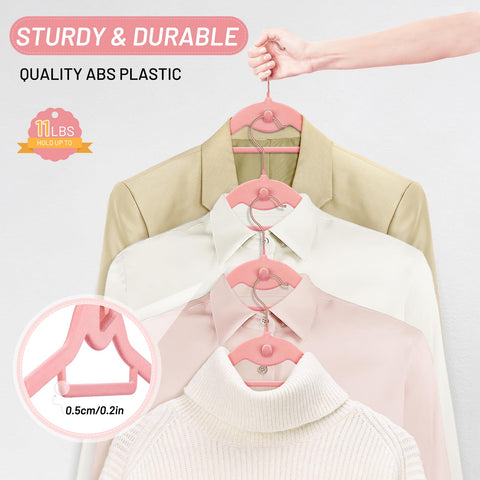 Stopklas pink velvet hanger holding a shirt without creases