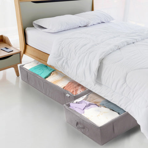 StorageExpert underbed bin with reinforced handles for simple access.