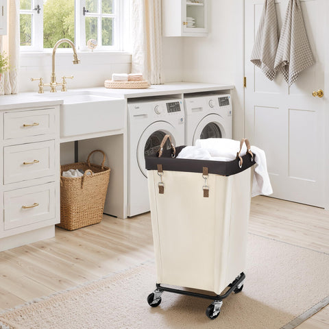 StorageWorks beige rolling hamper shown in a bedroom for convenient use
