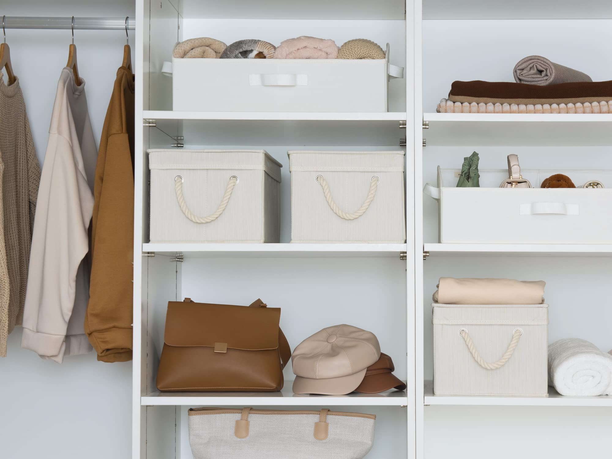 StorageWorks closet setup with T shirts and jeans neatly organized