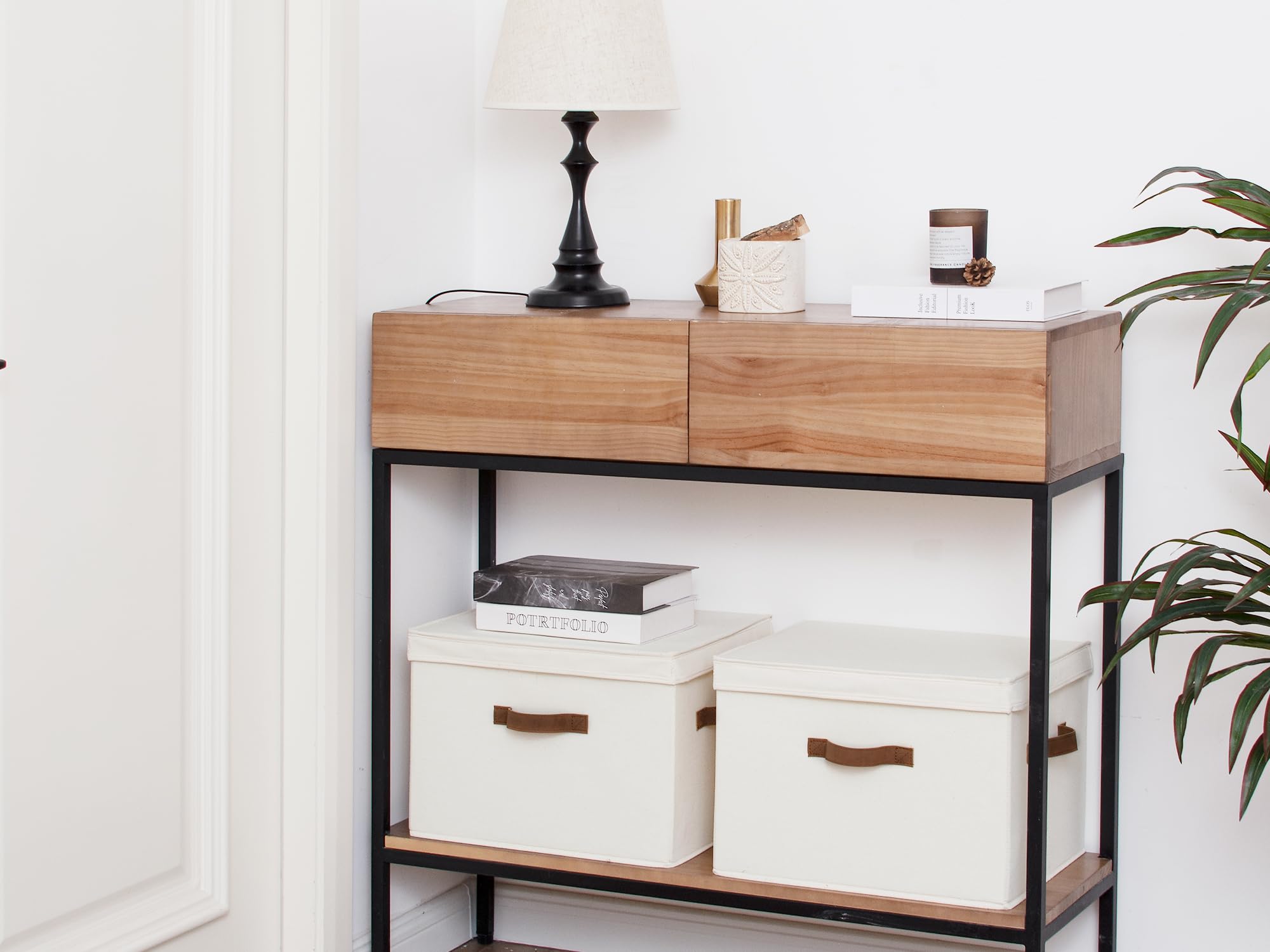 StorageWorks collapsible storage box tucked under the bed for compact organization.