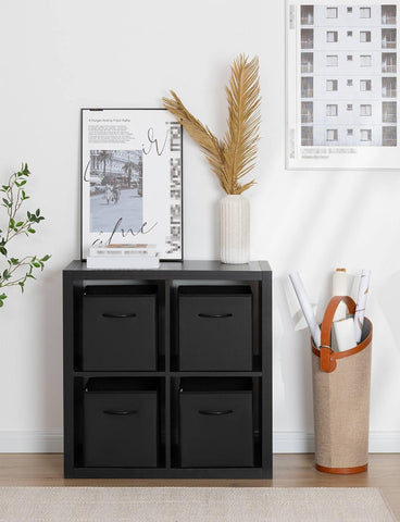 StorageWorks cube bin with side fabric handles for portability.