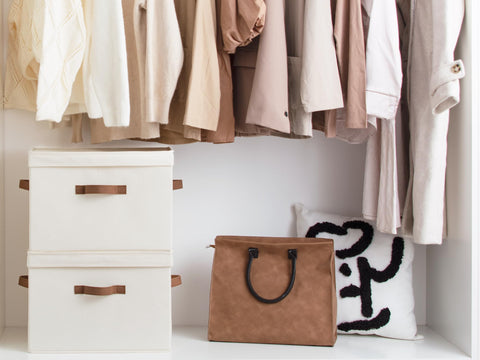 StorageWorks decorative white bins with handles for easy transport.