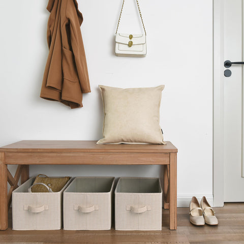 StorageWorks fabric storage bin on laundry shelf with heavy-duty boards.