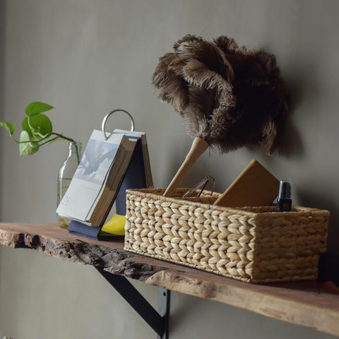StorageWorks handwoven basket on iron frame showcases durability.