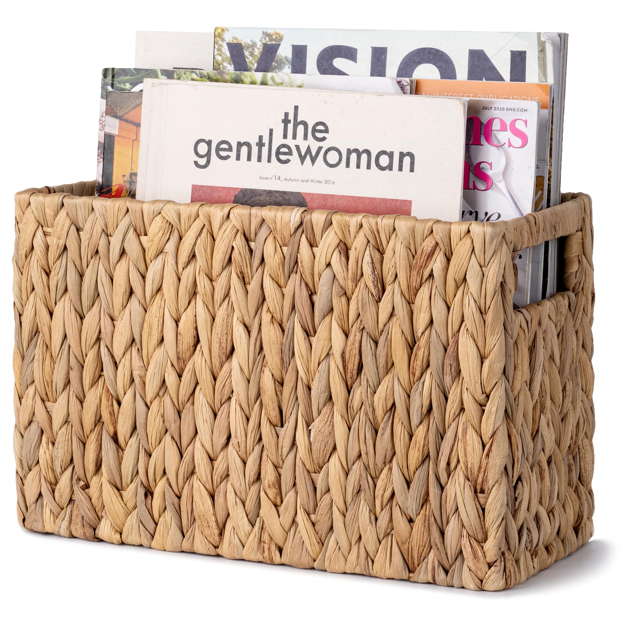 StorageWorks magazine holder in natural water hyacinth weave keeps spaces organized.
