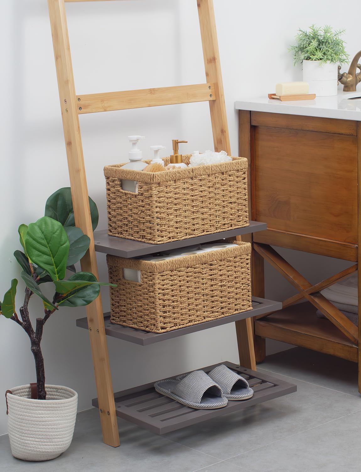 StorageWorks round basket in pantry for snacks and toiletries storage.