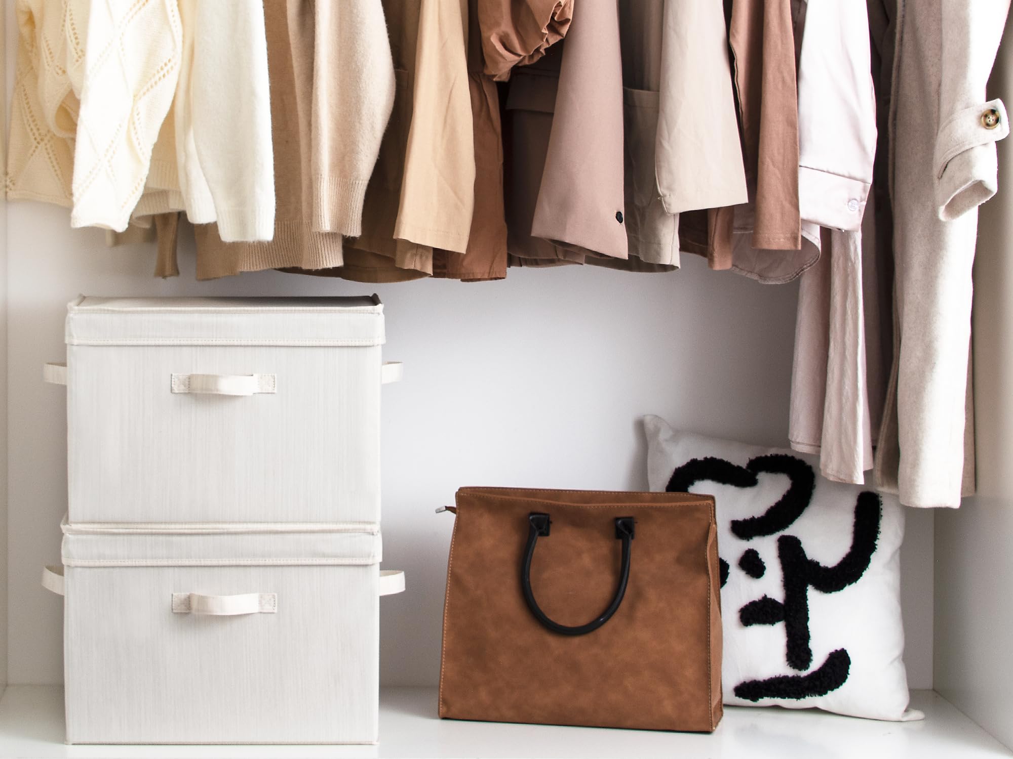 StorageWorks stackable bin on a shelf increases closet space.