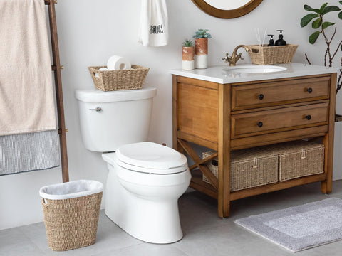 StorageWorks wicker waste basket in a bathroom for tidy waste collection.