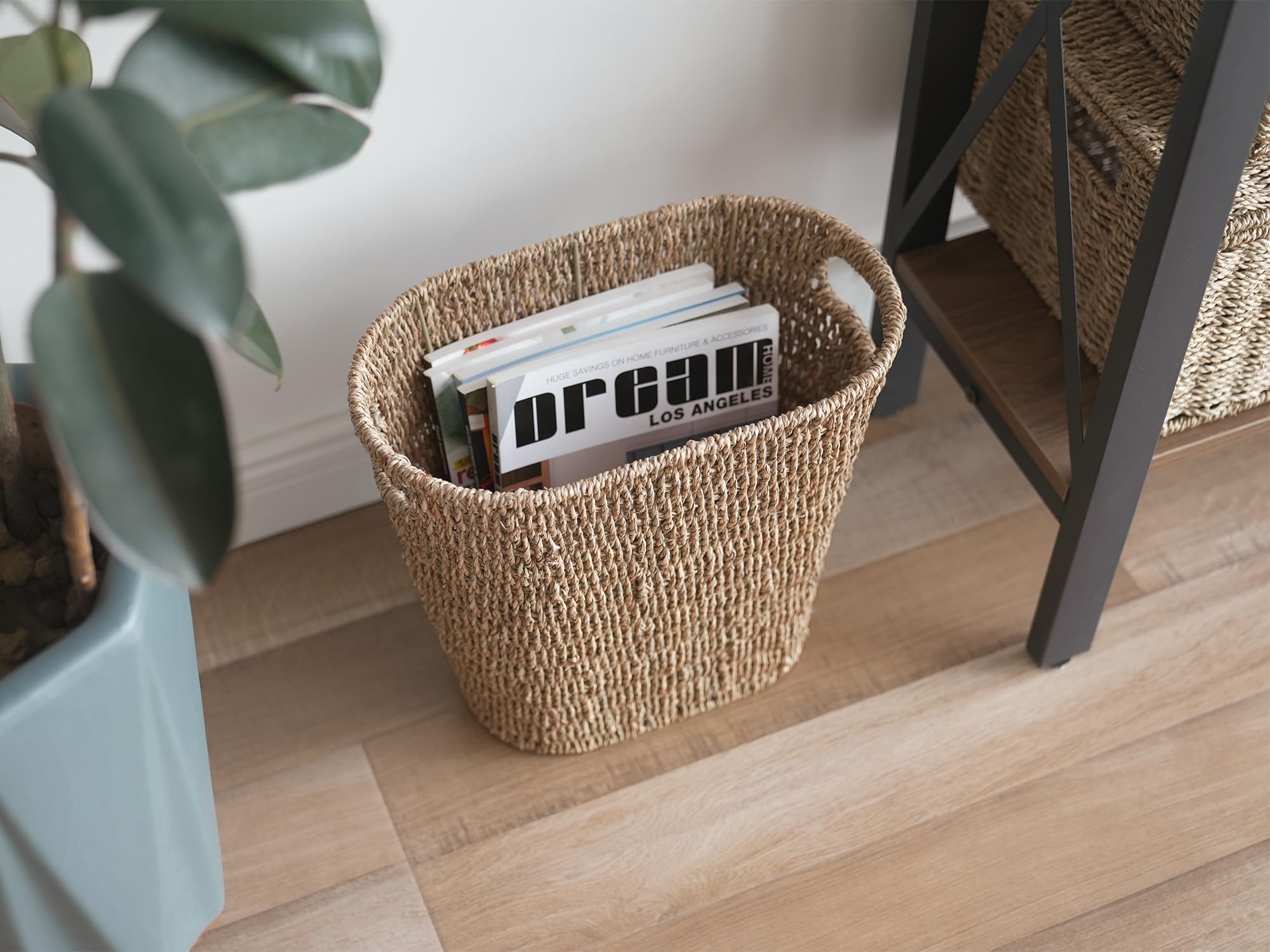 StorageWorks wicker waste basket in an office setting for subtle organization.