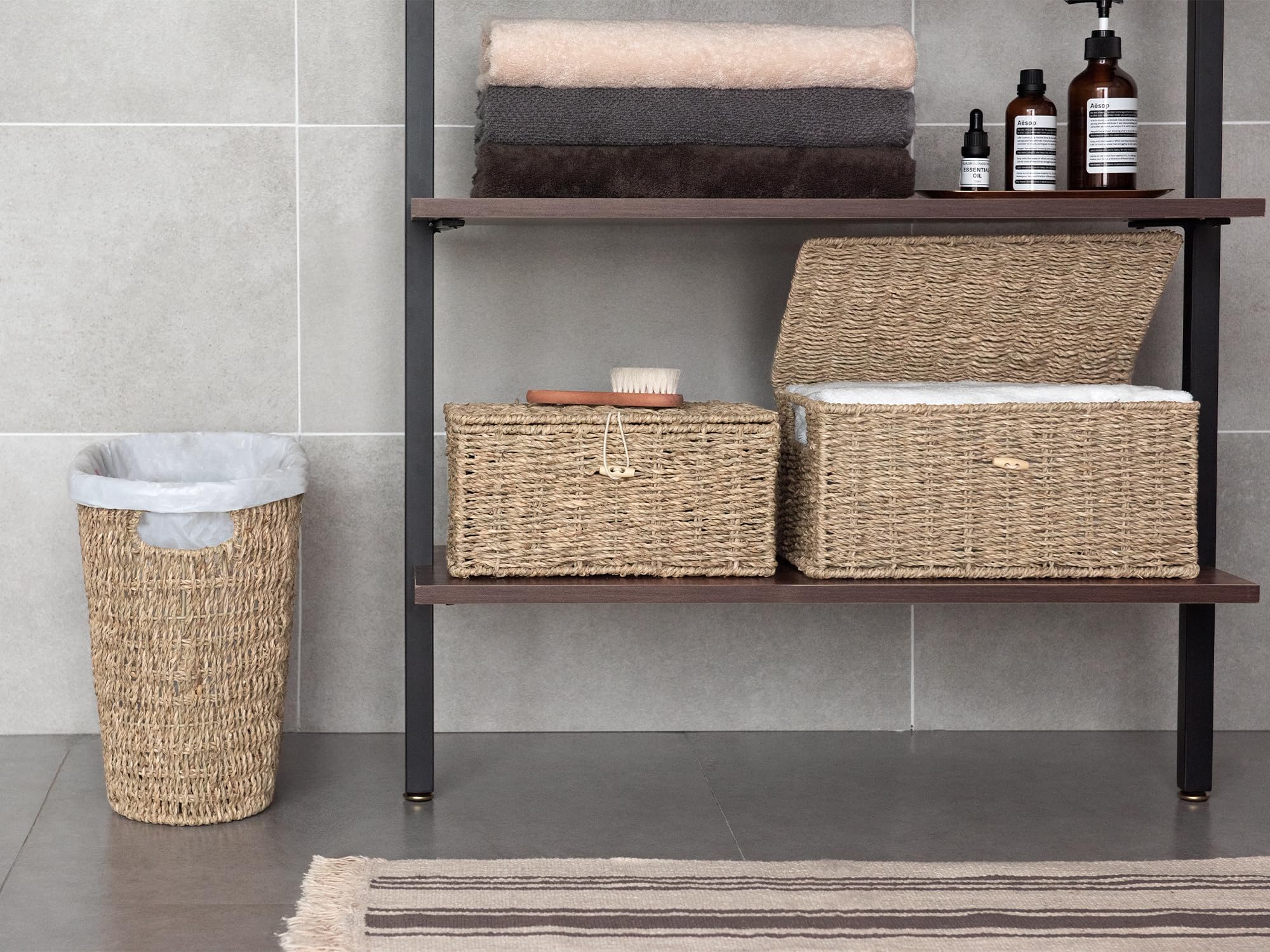 StorageWorks wicker waste basket featuring wooden handles for portability.