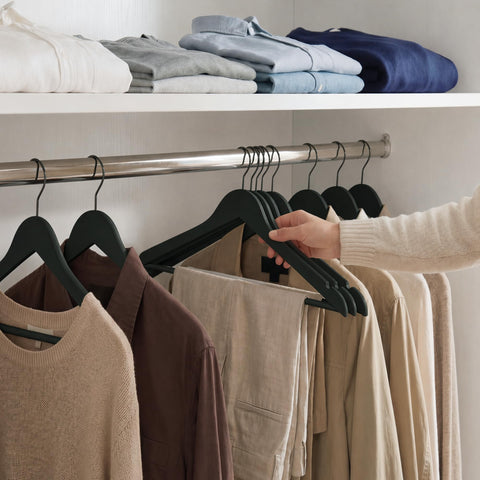 StorageWorks swivel-hook hangers offer easy access in busy closets.