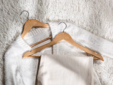 StorageWorks heavy-duty hanger supports bulky coats and suits with ease.