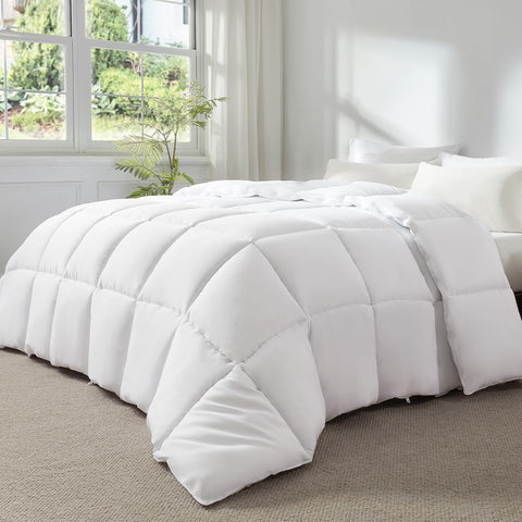 STWIENER duvet with loops secures to large covers for tidy bedding.