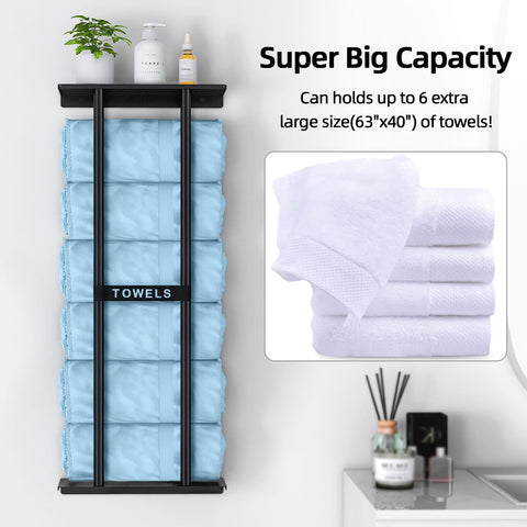 STWWO wall-mounted rack holding rolled towels for easy access.