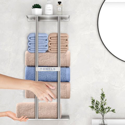 STWWO wall rack holding rolled towels on top shelf, perfect for tight bathrooms.