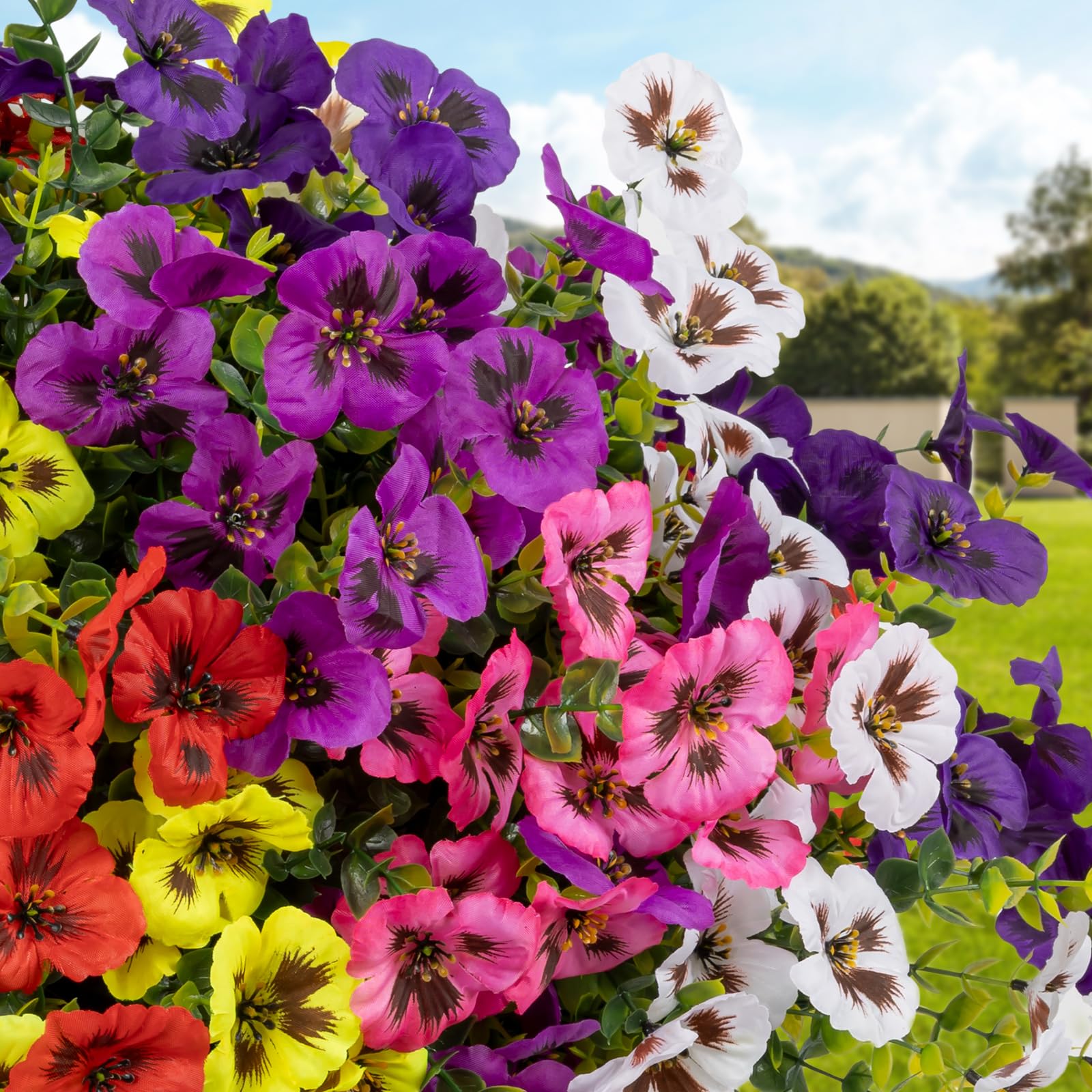 StyleNest pansy blooms in hanging planters add vertical interest.