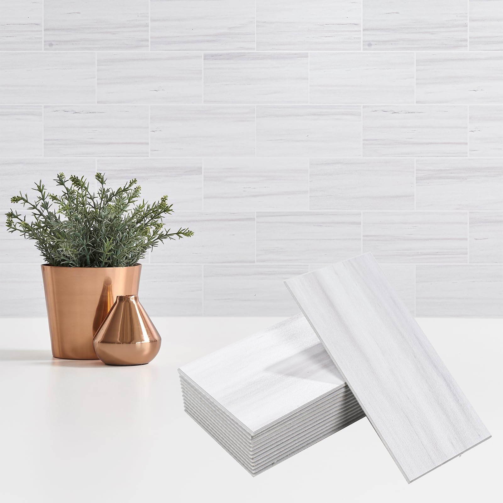 StyloVue Dolomite Star Gray tiles offer a chic marble look for kitchen backsplashes